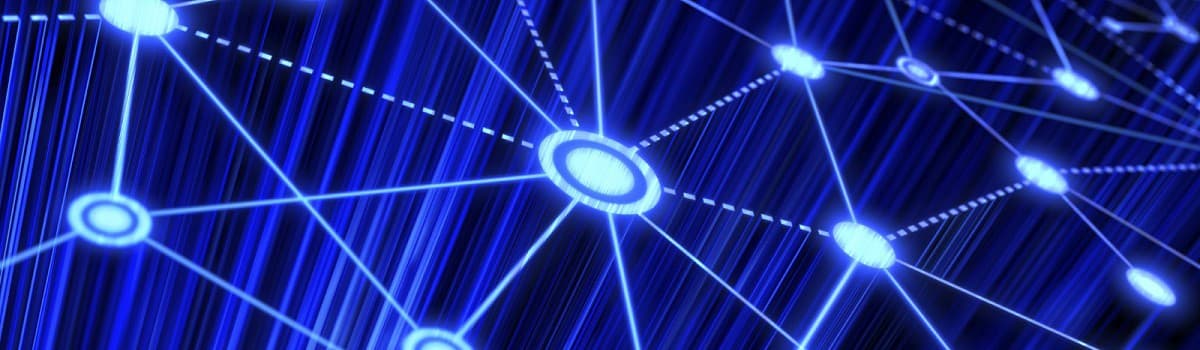 Abstract blue network graphic with glowing dots and connecting lines on a dark background.